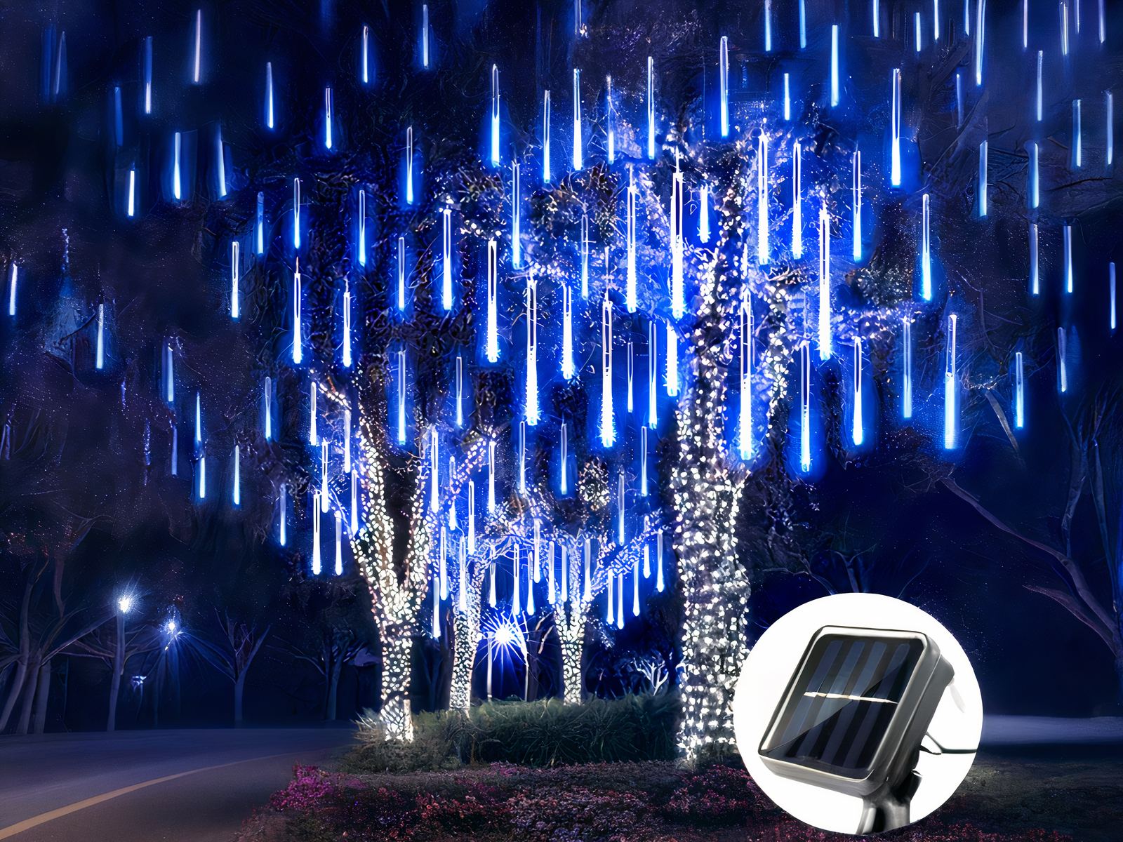 Guirlande LED solaire imperméable effet pluie installée dans des arbres de nuit