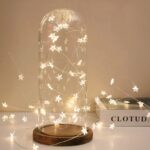 Guirlande mini LED design en forme d'étoiles Guirlande mini LED design en forme d'étoiles, positionné autour d'un bocal en verre de décoration.