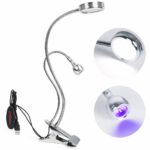 Lampe UV LED argentée à double tête Lampe UV LED argentée à double tête sur fond blanc