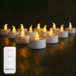 Lot de 12 bougies LED flamme vacillante petit format avec télécommande Lot de 12 bougies LED flamme vacillante petit format avec télécommande, sur un fond noir.