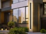 Lampe LED d'extérieur design et élégante allumée sur le mur d'un immeuble