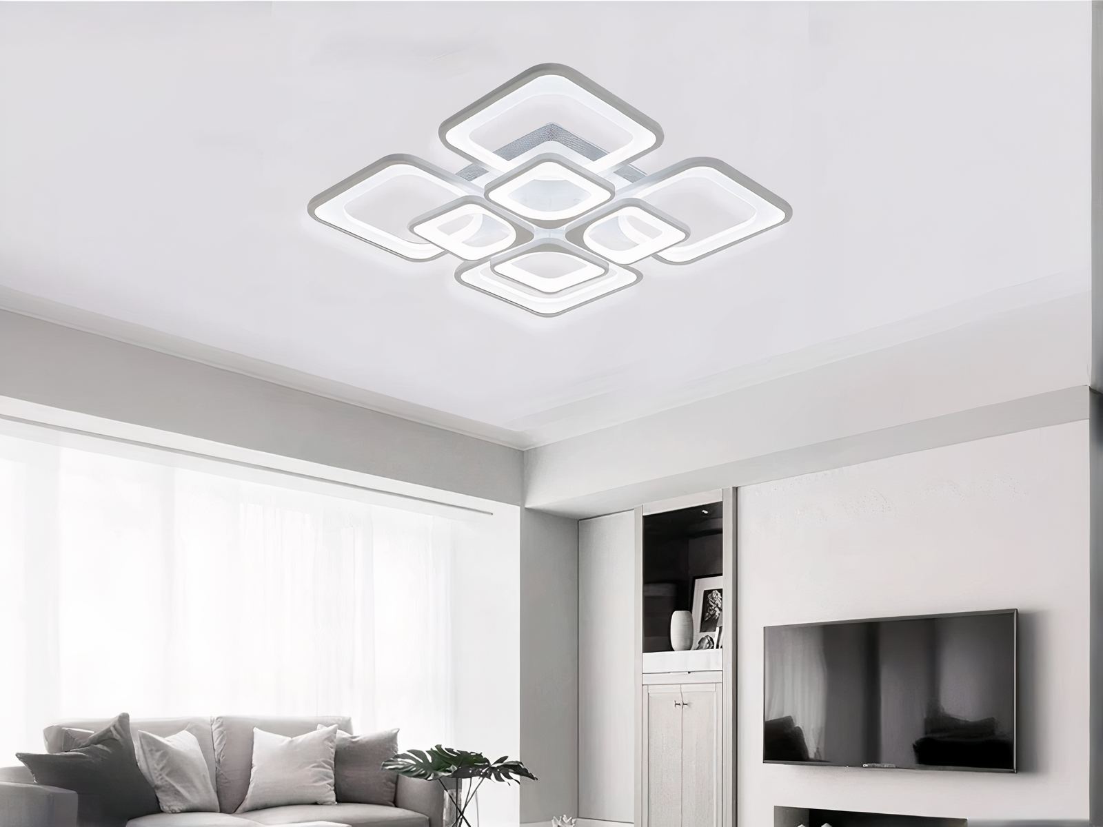 Luminaires LED intérieur élégant et carré, de couleur blanc, au plafond dans un salon.