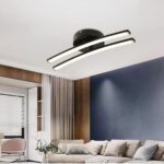 Luminaire LED moderne et élégant noir Luminaires LED moderne et élégant noir, constitué de 2 patins lumineux, dans un salon.