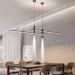 Lustre LED design et ajustable Lustre LED Design et Ajustable allumé dans un salon au-dessus d'une table à manger