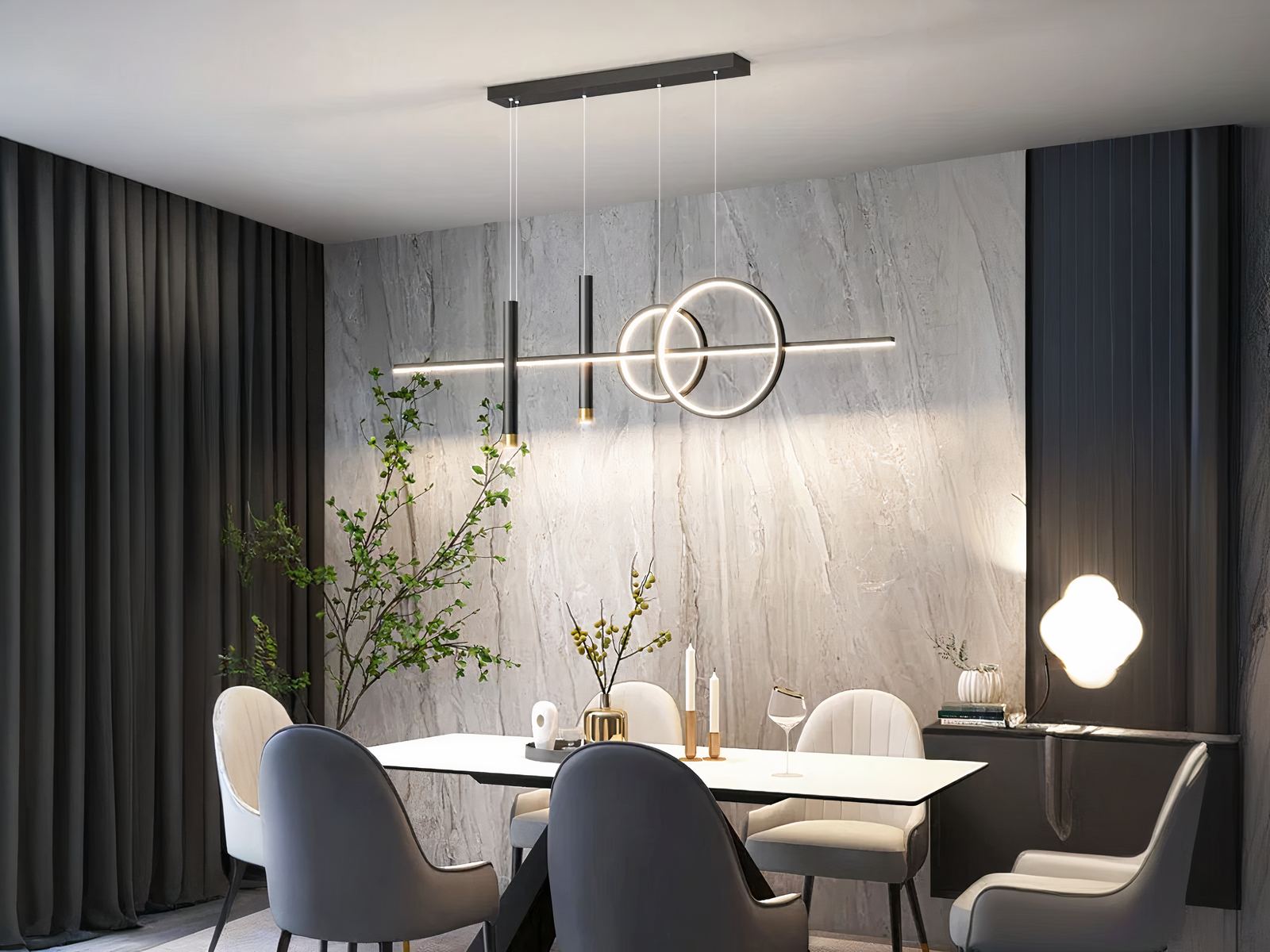 Lustre LED noir décoratif et minimaliste allumé à un plafond dans une salle à manger