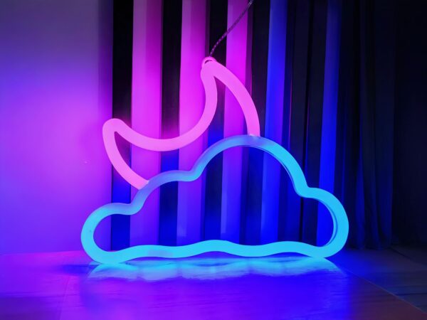 Néon LED en forme de nuage avec lune, de couleur rose et bleu.