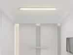 Panneau LED blanc design moderne et minimaliste, dans une pièce blanche.