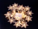 Rideau LED design en forme de flocon de neige