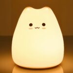 Lampe LED sans fil lumineuse pour enfant Lampe LED sans fil lumineuse pour enfant sur fond marron