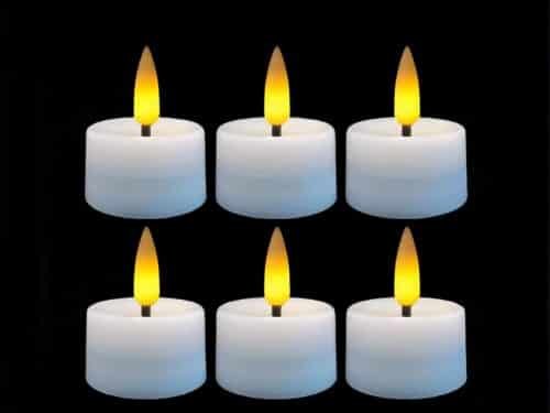 Lot de 6 bougies LED flamme vacillante avec lumière jaune, sur un fond noir.