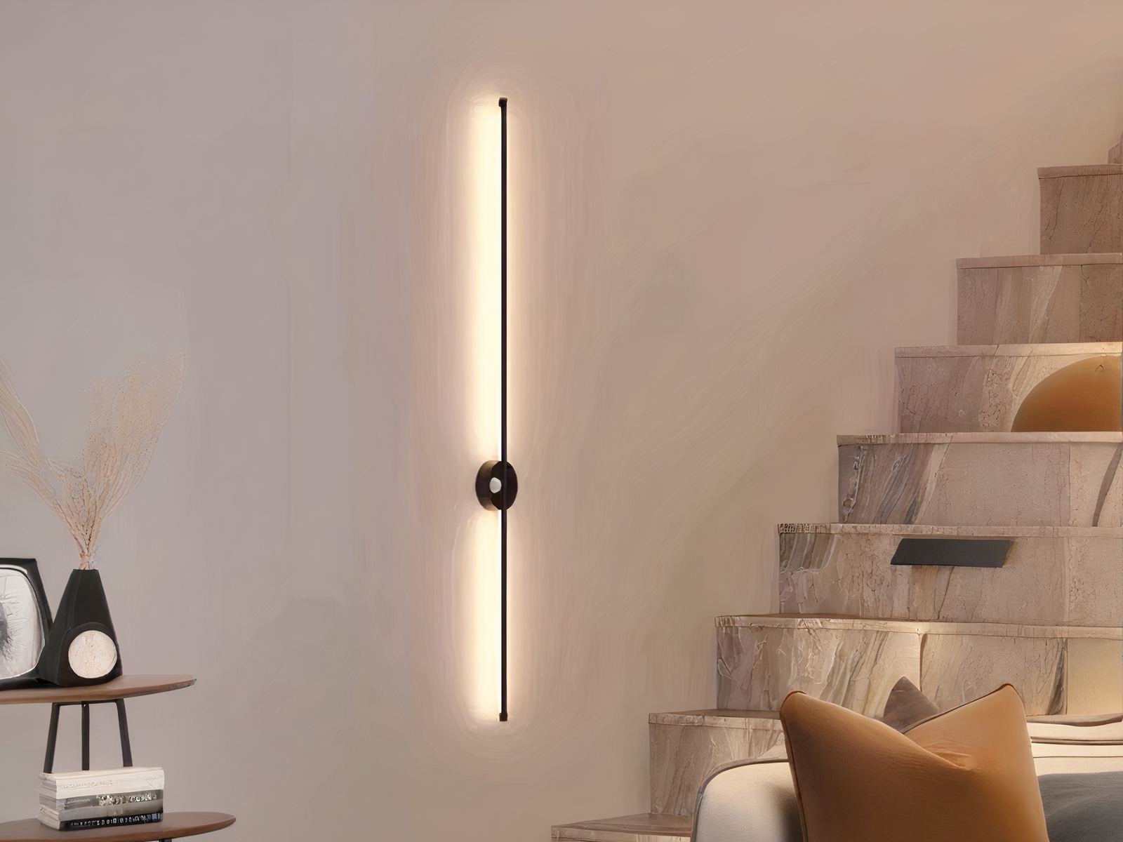 Luminaire LED mural noir élégant et épuré allumé sur un mur