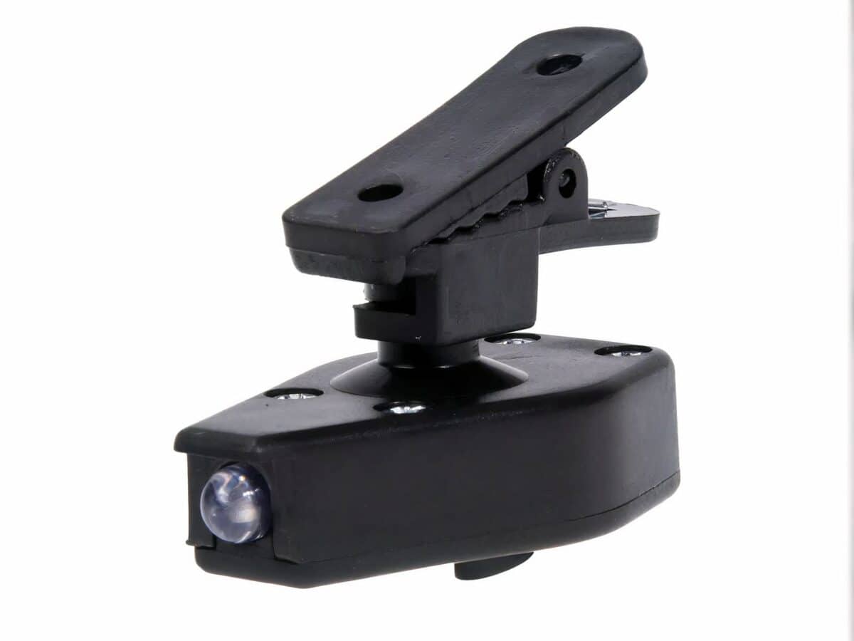 Mini lampe LED à pince pour lunettes Mini lampe LED à pince pour lunettes, de couleur noir, sur un fond blanc.