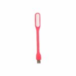 Mini lampe LED flexible rose et USB, sur un fond blanc.