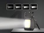 Mini lampe LED multifonctionnelle pour porte clés, sur un fond noir