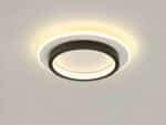 Plafonnier LED circulaire noir et blanc allumé et installé sur un plafond gris.