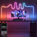 Ruban led 12v connecté multifonction, multicolore derrière un ordinateur, controlé par un téléphone.