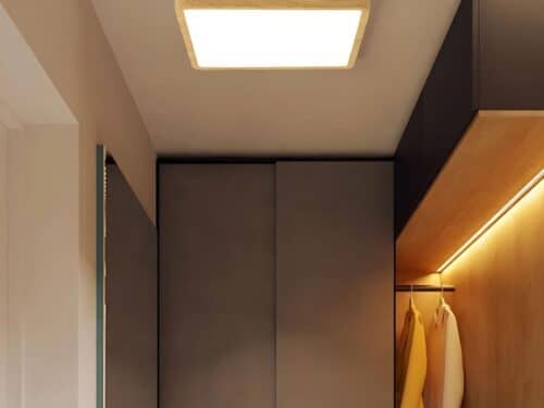 Le plafonnier carré à LED connecté en couleur bois, sur le plafond d'un couloir.