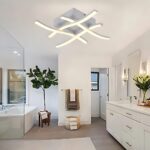 Plafonnier LED à 3 couleurs variables Le plafonnier à LED à trois couleurs variables dans une salle de bain blanche